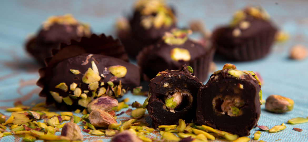 Date,Palm,Covered,With,Chocolate,And,Stuffed,With,Pistachio